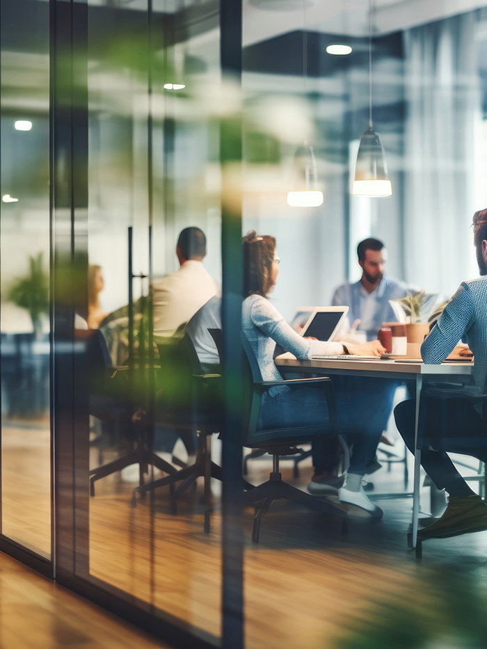 Business office with blurred people casual wear, with blurred bokeh background